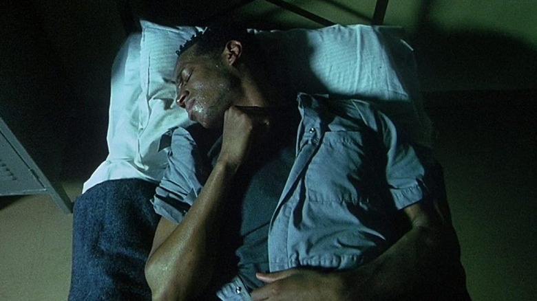 Marlon Wayans laying in bed Requiem for A Dream