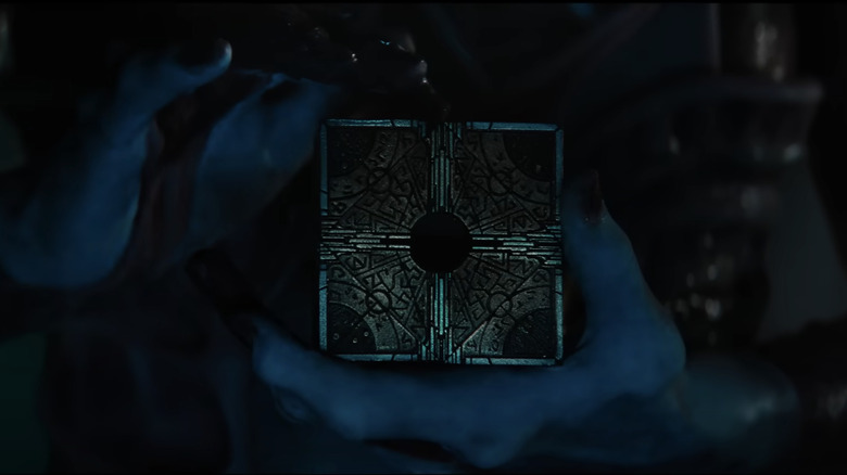 Jamie Clayton and the puzzlebox in Hellraiser