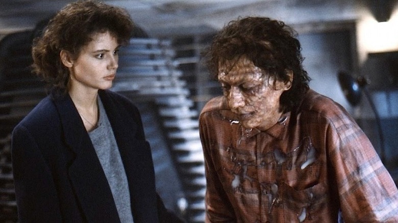 Geena Davis and a diseased Jeff Goldblum in The Fly