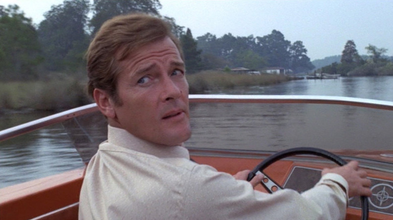 Roger Moore' Bond in boat chase