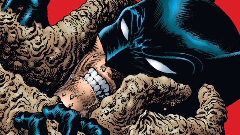 Clayface grabbing Batman's head