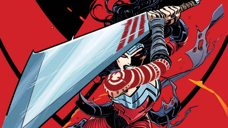 Diana charges into battle holding huge swords on the cover of Absolute Wonder Woman