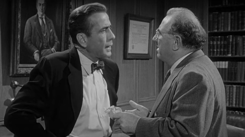 Bogart arguing newspaper estate Deadline USA