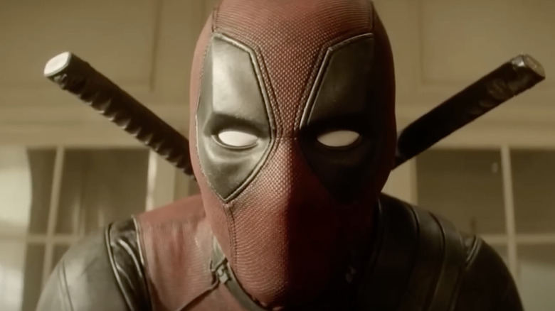 Wade looks at Baby Hitler in Deadpool 2