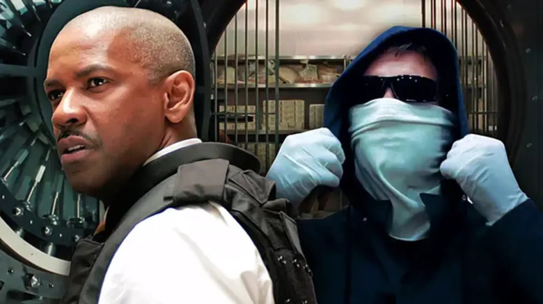 Denzel Washington as Detective Keith Frazier in a police uniform is next to Clive Owen as Dalton Russell, who is wearing a mask and sunglasses, with an open bank safe in the background in Inside Man