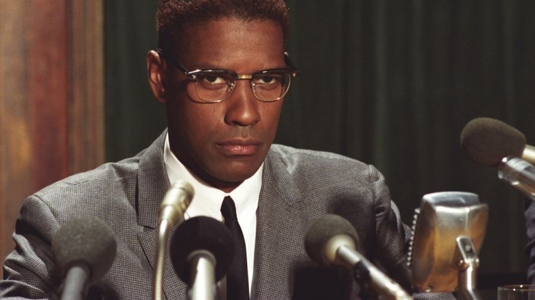 Denzel Washington steps up to the mic as Malcolm X