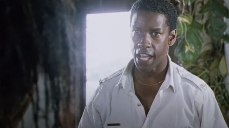 Denzel Washington as Xavier Quinn yells at someone in The Mighty Quinn