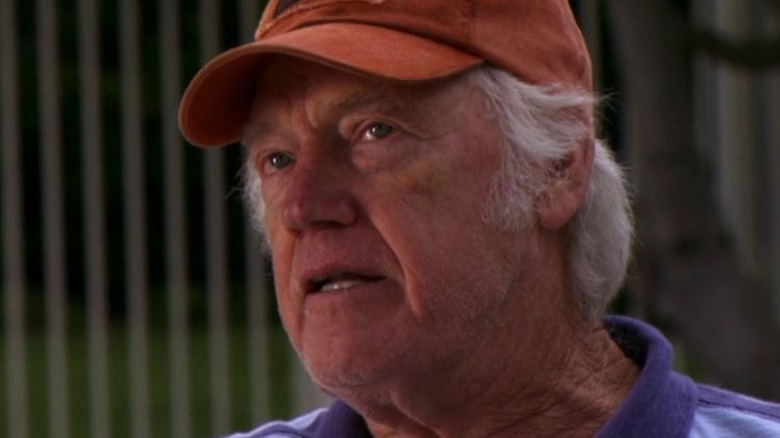 Ronny Cox as Walter Kenney (The Tooth Fairy Killer) sitting at a country club on Dexter