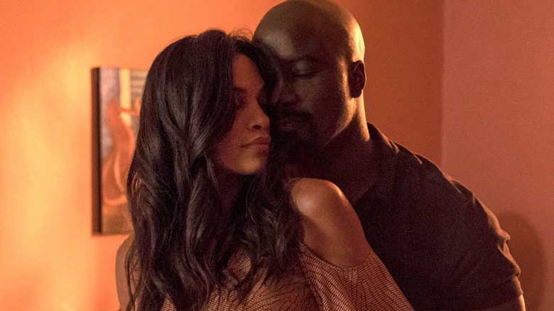 Rosario Dawson as Claire and Mike Colter as Luke Cage