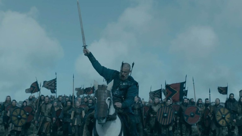 Bjorn raising his sword in front of an army in Vikings