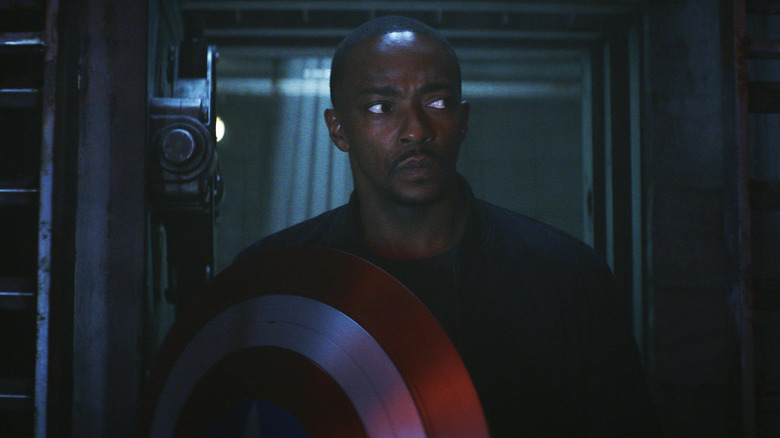 Sam Wilson on Anthony Mackie holds his shield by entering a bunker in Captain America: A brave new world