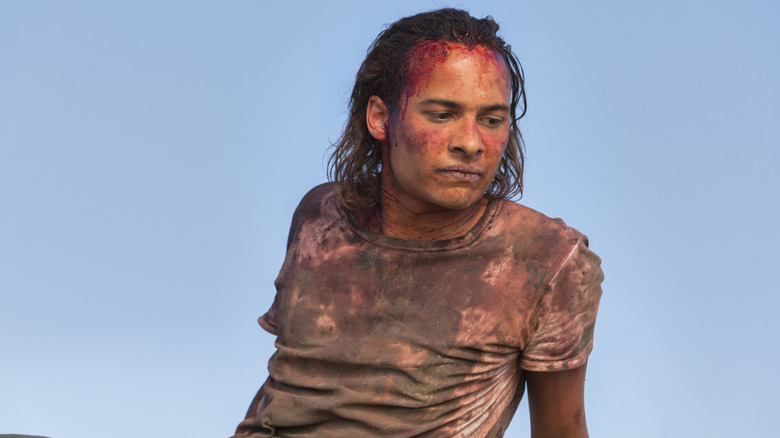 Frank Dillane's Nick sitting down stained with blood in Fear the Walking Dead