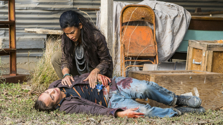 Danay García's Luciana hunched over Nick's dead body in Fear the Walking Dead