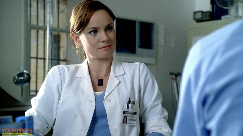 Sara Tancredi talks ot a patient at her office in Prison Break