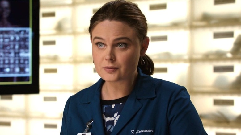 Emily Deschanel's Temperance Brennan wearing blue lab coat on Bones