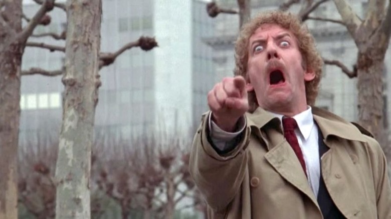 Donald Sutherland pointing in Invasion of the Body Snatchers