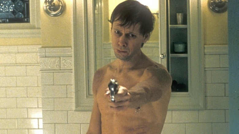 Donnie Wahlberg holding gun
