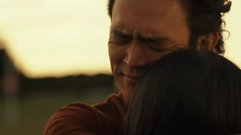 John Cho and Mia Isaac hug as Max and Wally Park in "Don't Make Me Go"