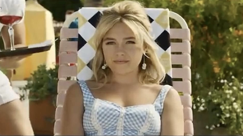 woman sitting in a lounge chair