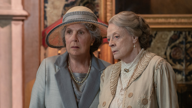 Penelope Wilton and Maggie Smith looking puzzled in Downton Abbey: A New Era