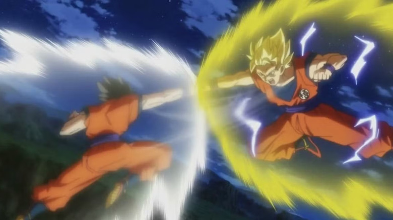 Goku and Gohan punching each other in Dragon Ball