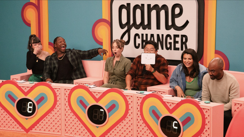 The cast of the Game Changer episode 'The Newly-web Game' screaming about a result