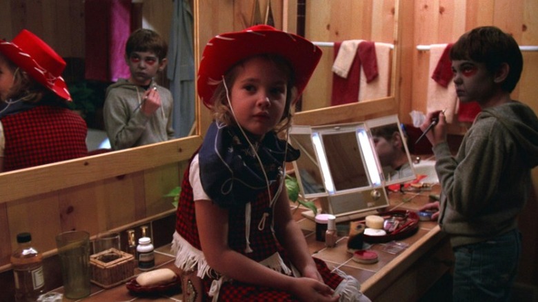 Drew Barrymore and Henry Thomas in E.T. the Extra-Terrestrial