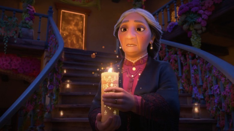 Abuela Alma Madrigal holds the family's magical candle