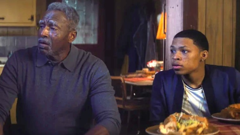 Carl Lumbly's Isaiah Bradley and Elijah Richardson's Eli Bradley at the dinner table on The Falcon and The Winter Soldier