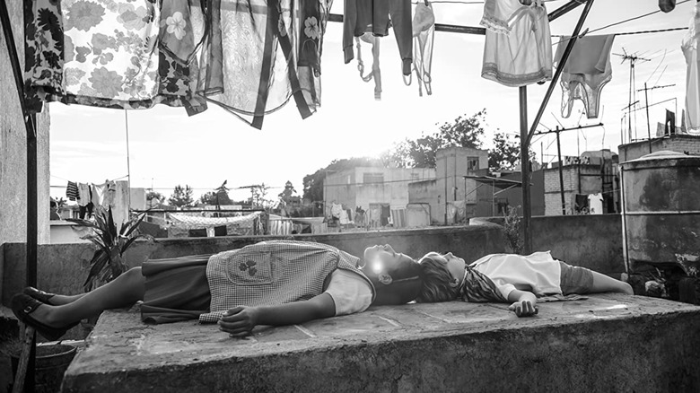 Kids lying down in Roma