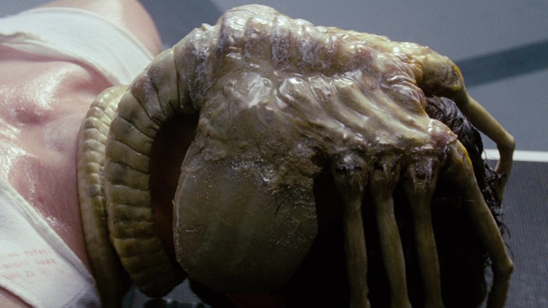 Facehugger alien from Alien attached to Kane's face