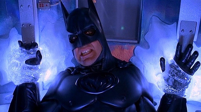 Batman frozen to the wall by Mr Freeze's gun