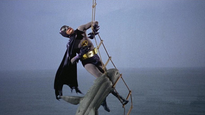 Batman being attacked by a shark. Oh, for some bat-shark-repellant.