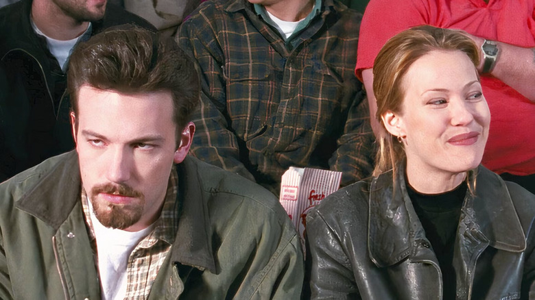 Ben Affleck as Holden McNeil looks angry next to Joey Lauren Adams as Alyssa Jones in Chasing Amy