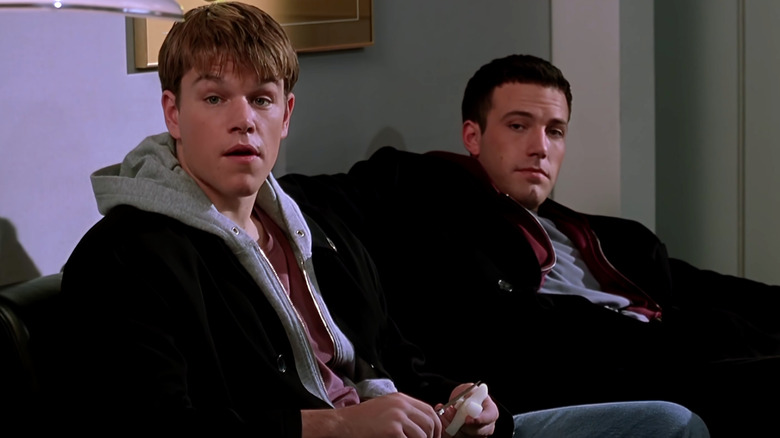 Matt Damon as Loki sits next to Ben Affleck as Bartleby in Dogma