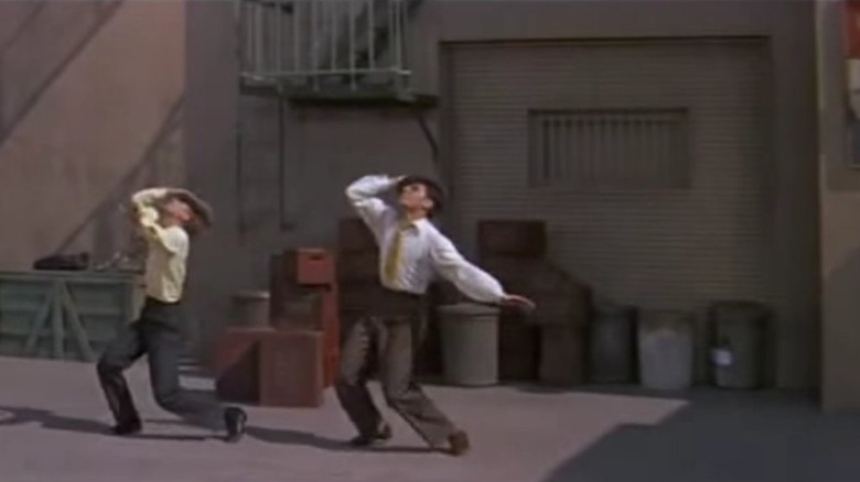 Fosse competes in a dance-off that he choreographed