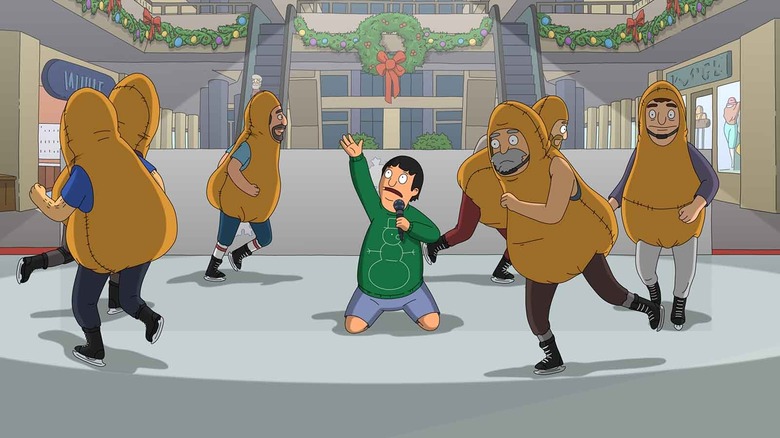 Gene sings in an ice rink as dancers dressed like chicken nuggets skate around him