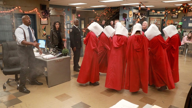 Handmaids in red robes