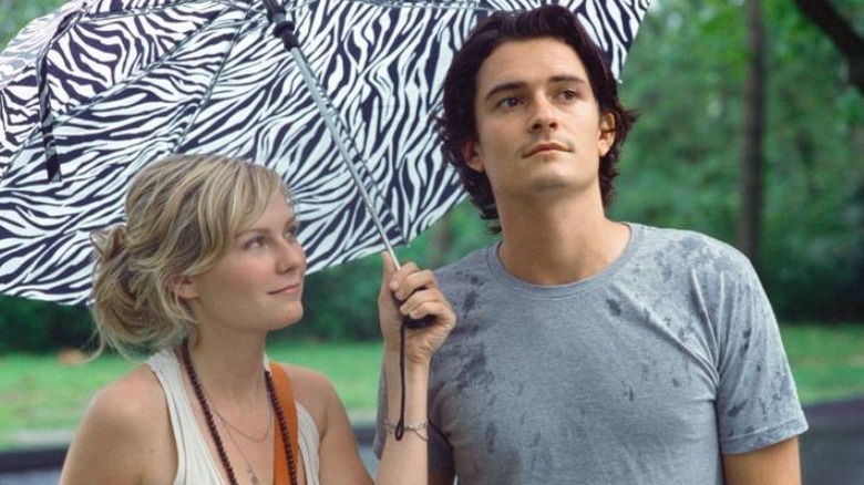 Kirsten Dunst Orlando Bloom zebra umbrella