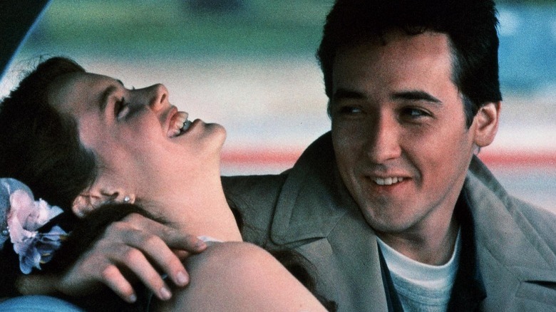 Ione Skye laughing John Cusack smiling