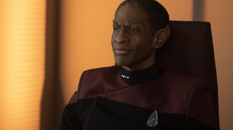 A Changeling, disguised as Tuvok, smirking on Star Trek