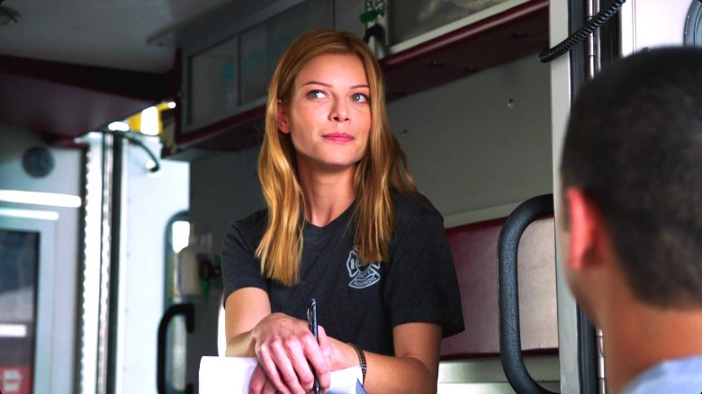 Chicago Fire's Leslie Shay sitting in the ambulance