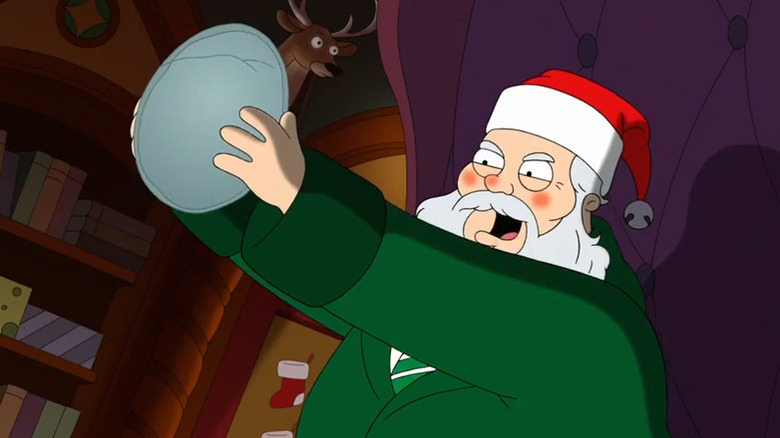 Santa Claus holding up a round stone on American Dad!