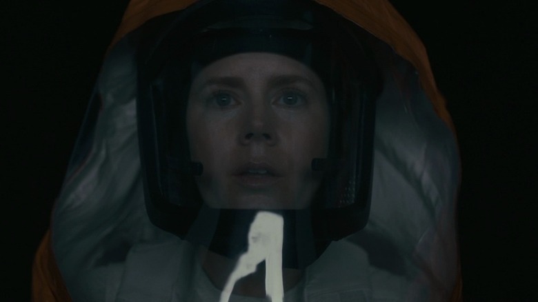 Amy Adams' Louise Banks stares at heptapods in Arrival