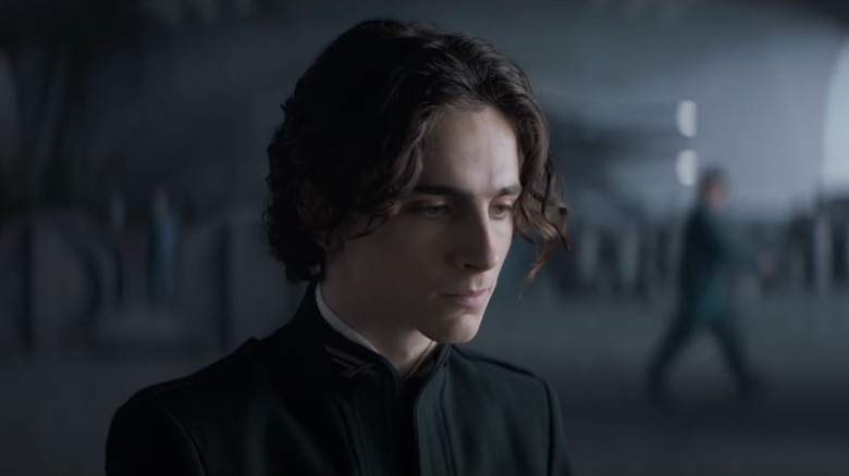 Timothée Chalamet's Paul Atreides ponders in Dune