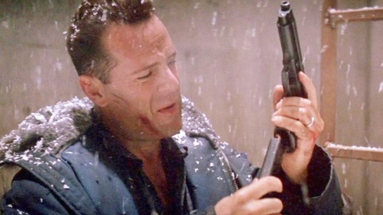 John McClane loads gun in snowstorm Die Hard 2