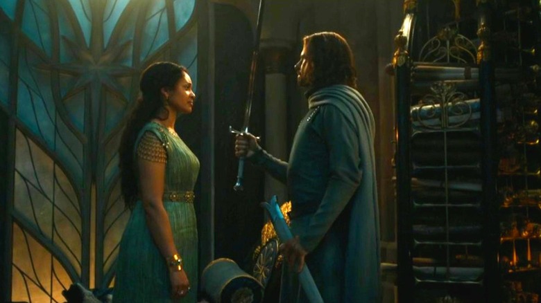 Elendil holds Narsil before Míriel