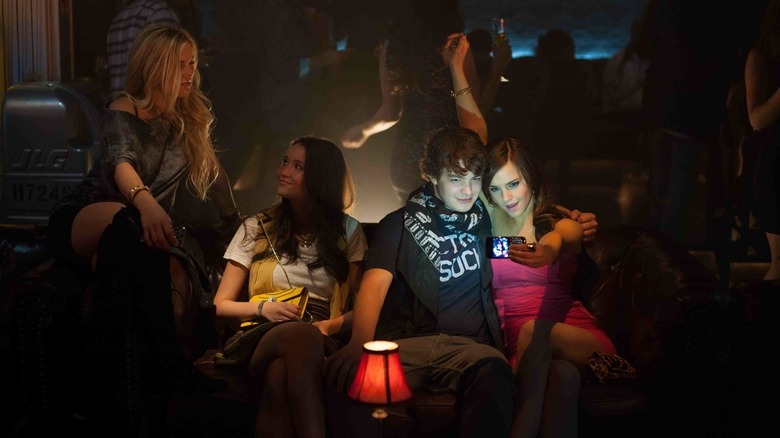 Rebecca, Marc and Nicki in a club taking a selfie in The Bling Ring