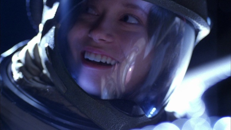 Summer Glau smiling spacesuit