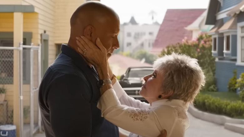 Rita Moreno clutching Vin Diesel's face